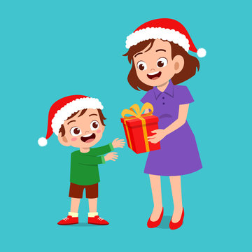 happy parent give present to kid christmas