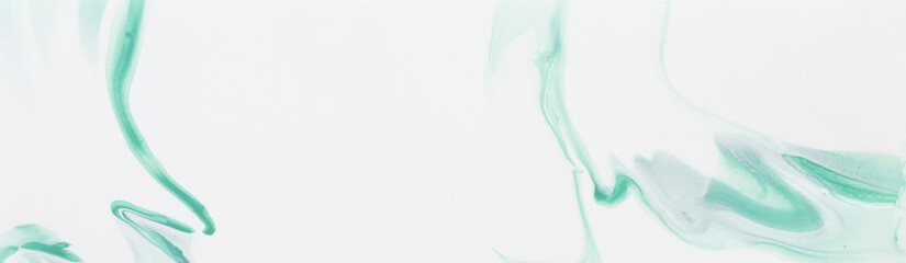 photography of abstract marbleized effect background. gold and white creative colors. Beautiful paint. banner