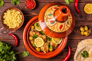 Traditional moroccan tajine of chicken with salted lemons, olives - obrazy, fototapety, plakaty