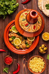 Traditional moroccan tajine of chicken with salted lemons, olives
