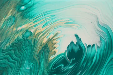 Kunstfotografie des abstrakten Hintergrunds mit marmoriertem Effekt. kreative Farben Türkis, Smaragdgrün, Blau und Gold. Schöne Farbe. © tomertu