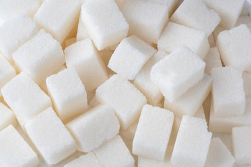 White sugar cubes as background