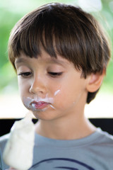 Happy Boy Enjoying an Ice Cream