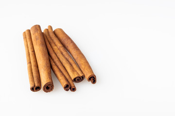 Cinnamon sticks on a white background