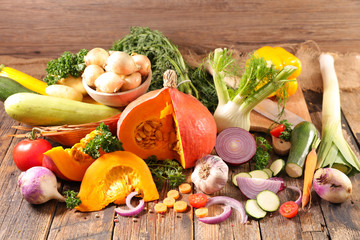 assorted of autumn vegetables- zucchini, pumpkin, leek, onion...