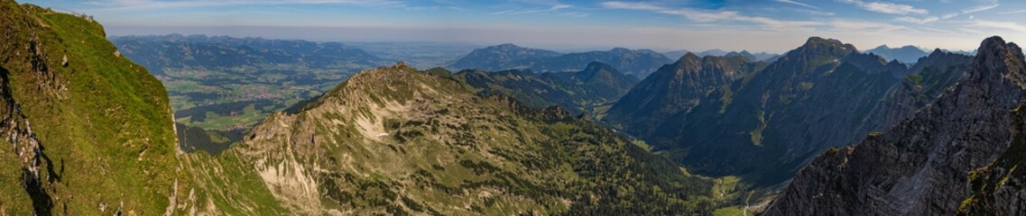 Naklejka premium High resolution stitched panorama of a beautiful alpine view at the famous Nebelhorn summit near Mittenwald, Bavaria, Germany