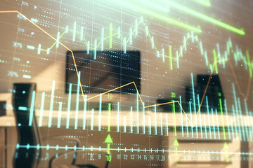 Stock market chart and desktop office computer background. Multi exposure. Concept of financial...