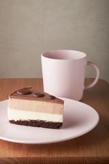 chocolate cake white and dark chocolate on a pink plate