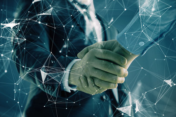 Double exposure of tech drawing on abstract background with two men handshake. Concept of technology in modern business