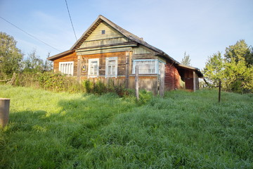 Fototapeta na wymiar village house on a sunny summer morning
