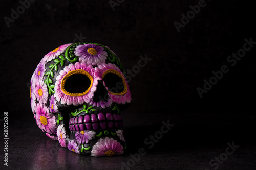 Typical Mexican Skull Painted On Black Background Dia De