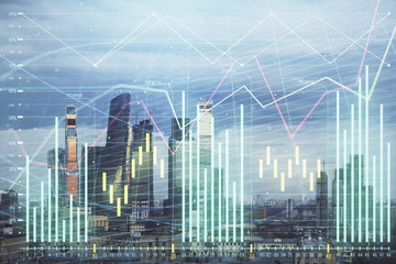 Fototapeta na wymiar Multi exposure of financial chart on Moscow city downtown background. Concept of stock market analysis
