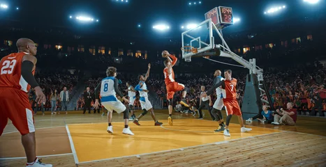 Küchenrückwand glas motiv Basketball players on big professional arena during the game. Tense moment of the game. Celebration © haizon