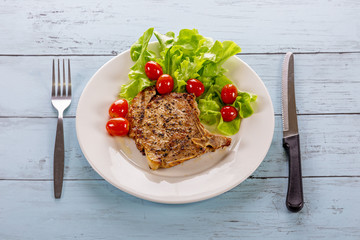 Pork steak white plate