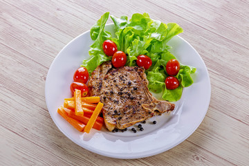 Pork steak white plate