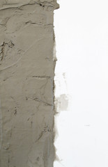 Background of old white concrete wall and new gray concrete wall.