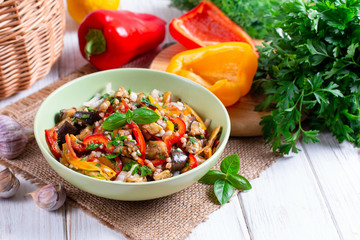 Salad with eggplant, pepper, onion and herbs