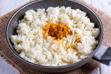 Cauliflower couscous in a pan