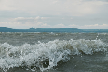 wave crests close up reflecting sun beams