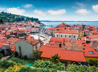 Sunny morning view of old town Piran. Splendid spring morning on Adriatic Sea. Beautiful cityscape...