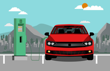 red electric car charging at the charger station