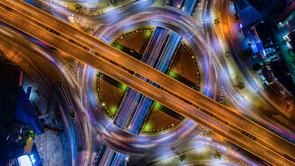 Aerial view Expressway motorway highway circus intersection at Night time Top view , Road traffic...