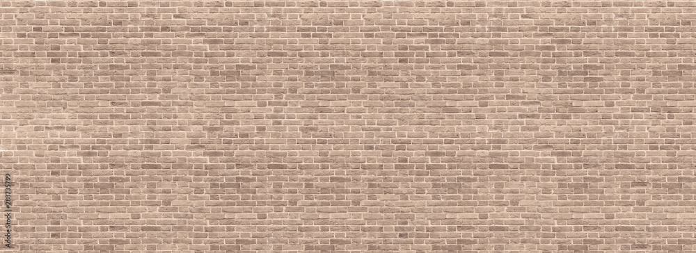 Poster panoramic background of wide beige brick wall texture. home or office design backdrop