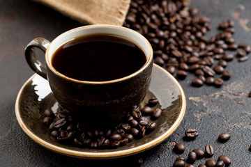 coffee and beans on a dark old table