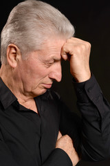 Close up portrait of thoughtful senior man