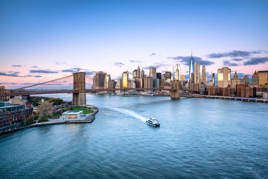 Aerial view of the Manhattan skyline and Brooklyn Bridge in New York City, USA