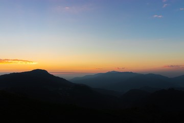 Beautiful landscape sunrise on the mountain with foggy. 