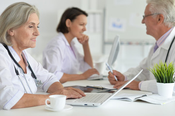 Obraz premium Portrait of professional doctors working in cabinet