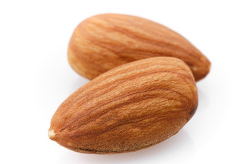 almonds isolated on white background close up. macro shot