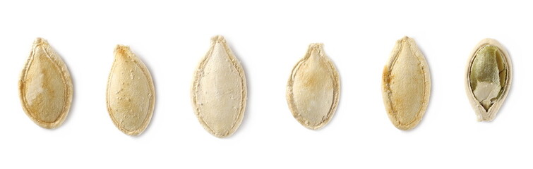 Set pumpkin seeds isolated on white background, macro top view