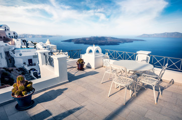 Sunny morning view of Santorini island. Picturesque spring scene of the  famous Greek resort Fira, Greece, Europe. Traveling concept background.