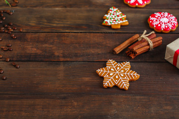 gingerbread, coffee and coffee beans (festive atmosphere christmas) happy new year. top food background. copy space