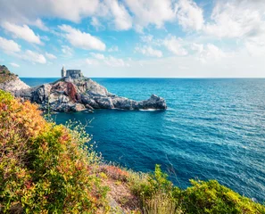 Fotobehang Attractive morning view of Saint Peter Church in Portovenere town. Picturesque spring seascape of Mediterranean sea, Liguria, province of La Spezia, Italy, Europe. Traveling concept background. © Andrew Mayovskyy