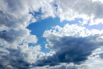 Fototapeta premium in the blue sky clouds and the sun.