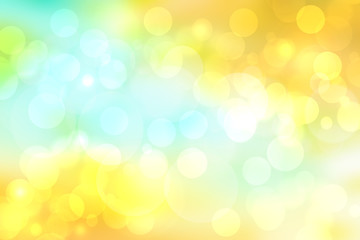 Abstract bright gradient motion spring or summer landscape texture background with natural gold yellow bokeh lights and blue bright sunny sky. Beautiful backdrop with space for design.