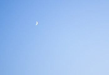 Crescent moon with beautiful sunset background