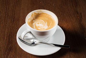 cup of cappuccino on the table