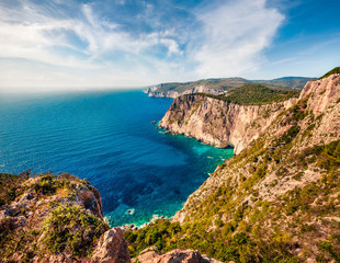 Fototapeta na wymiar Aerial spring view of high cliffs on the Ionian Sea. Sunny morning seascape of Zakynthos (Zante) island, Greece, Europe. Beauty of nature concept background.
