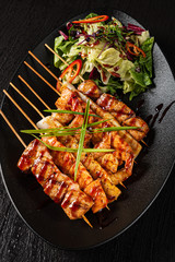 fish kebabs with fresh salad