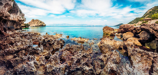 Beautiful spring panorama of cozy beach in northeastern Corinthia, Greece. Sunny outdoor scene of...