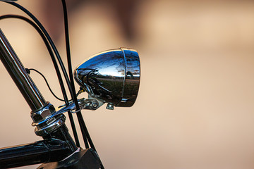 Bicycle lamp on old, well-kept bicycle © AnneGM