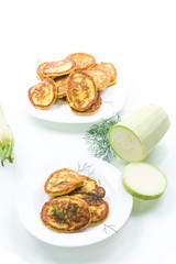 vegetable fritters made from green zucchini in a plate