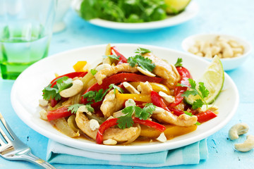 Chicken with vegetables in sweet and sour sauce.
