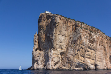 View from the sea on Cape Capo Caccia near Alghero city of Sardi