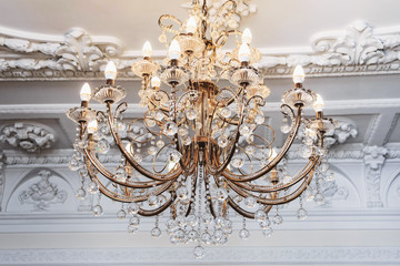 Luxurious vintage chandelier in the interior close-up