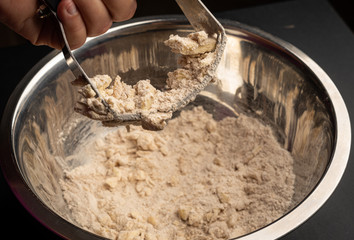 Butter being mixed in with recipe